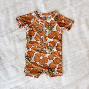 Kate Quinn Warm Vintage Pineapple Short Sleeve Zip Front Rash Guard Shortie